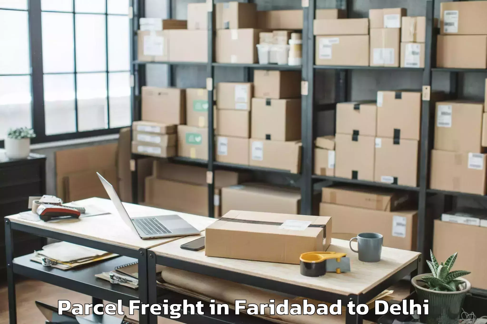 Book Faridabad to Iit Delhi Parcel Freight Online